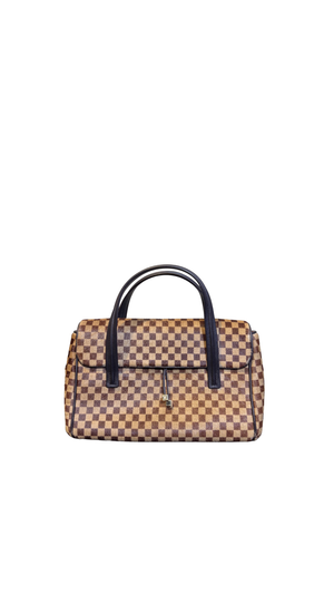 Louis Vuitton Chequered Limited Edition Damier Sauvage Calf Hair Lionne Bag brown tan tassle detail Vintage Classic Style Chic leather handles