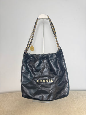 Chanel SS/2022 Black Quilted Shiny Calfskin Leather 22 Hobo Bag Calfskin Leather Gold Chain Shoulder Strap CC cocomark