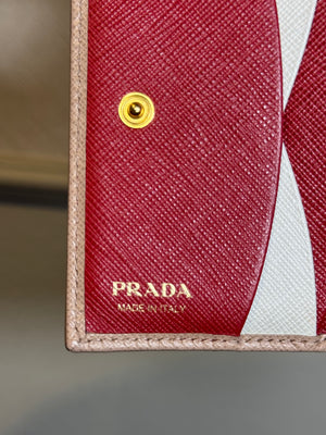 Prada Small Saffiano Leather Wallet Card Holder in Clay/Water Lily bi-fold wallet gold-toned Prada lettering red interior