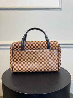 Louis Vuitton Chequered Limited Edition Damier Sauvage Calf Hair Lionne Bag brown tan tassle detail Vintage Classic Style Chic leather handles