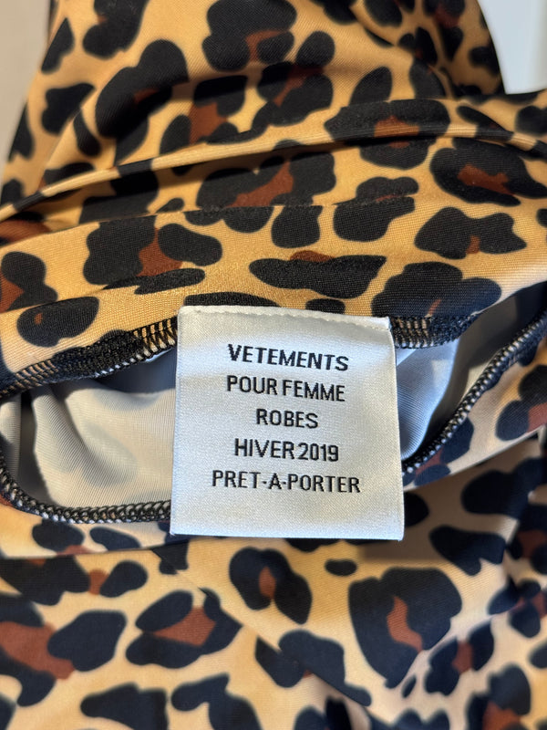 VETEMENTS 2019 collection 'The Styling Dress' leopard print body con mini dress with gloves turtleneck sexy