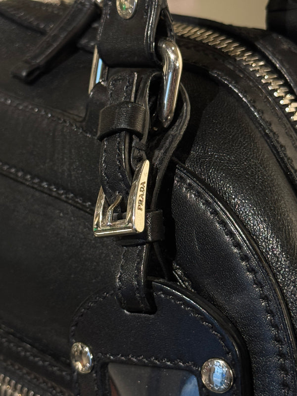 Prada Black Leather Bowling Bag Multi Zip Pocket Top Handle Shoulder Bag Silver Hardware Luggage Tag Dust Bag