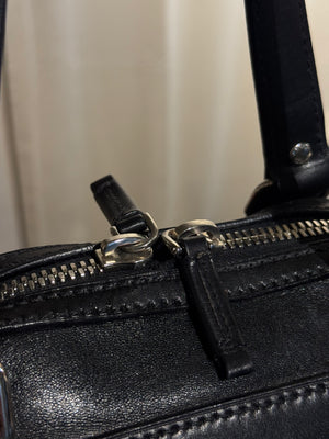 Prada Black Leather Bowling Bag Multi Zip Pocket Top Handle Shoulder Bag Silver Hardware Luggage Tag Dust Bag