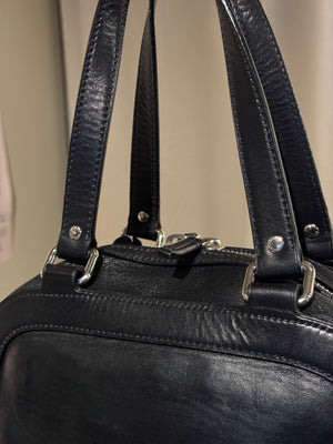 Prada Black Leather Bowling Bag Multi Zip Pocket Top Handle Shoulder Bag Silver Hardware Luggage Tag Dust Bag