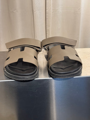 Hermes Chypre Sandals Taupe Grey Leather Black Rubber Sole H Cutout Adjustable Strap Size EU 40 Box