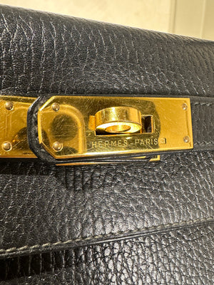 Hermès Kelly 32 Handbag Black Top Handle Vintage Clochette Lock Black leather Gold Hardware Very Good Condition Iconic