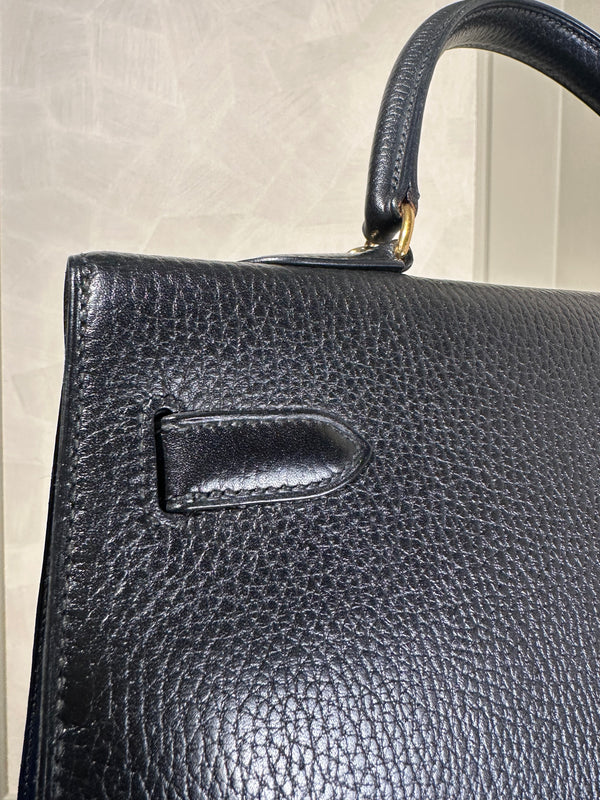 Hermès Kelly 32 Handbag Black Top Handle Vintage Clochette Lock Black leather Gold Hardware Very Good Condition Iconic