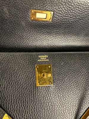 Hermès Kelly 32 Handbag Black Top Handle Vintage Clochette Lock Black leather Gold Hardware Very Good Condition Iconic