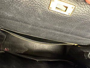 Hermès Kelly 32 Handbag Black Top Handle Vintage Clochette Lock Black leather Gold Hardware Very Good Condition Iconic