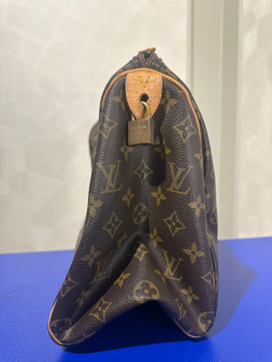 Louis Vuitton Speedy 35 Bag Vintage Monogram Classic Style Chic bowler bag brown leather handles good condition