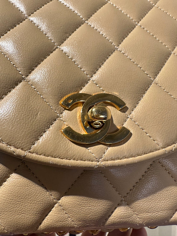 Chanel Beige Small Curved Flap Quilted Lambskin Vintage CC Half Moon Single Flap Shoulder 24k Gold chain Hardware Classic Iconic