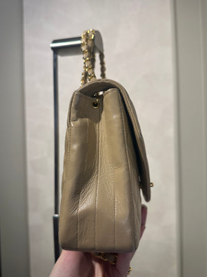 Chanel Beige Small Curved Flap Quilted Lambskin Vintage CC Half Moon Single Flap Shoulder 24k Gold chain Hardware Classic Iconic