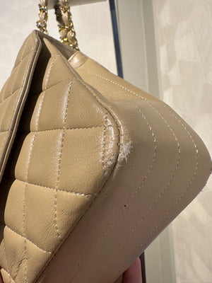 Chanel Beige Small Curved Flap Quilted Lambskin Vintage CC Half Moon Single Flap Shoulder 24k Gold chain Hardware Classic Iconic