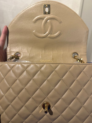 Chanel Beige Small Curved Flap Quilted Lambskin Vintage CC Half Moon Single Flap Shoulder 24k Gold chain Hardware Classic Iconic