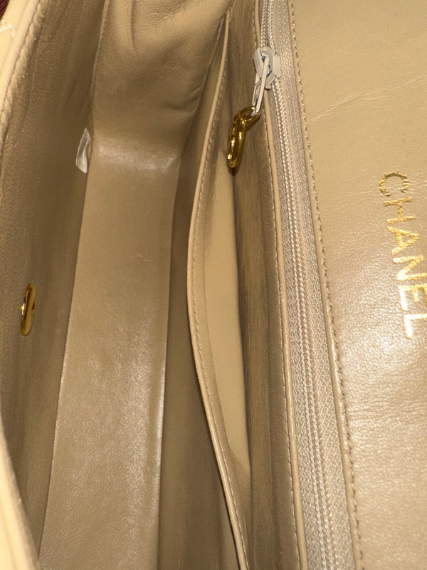Chanel Beige Small Curved Flap Quilted Lambskin Vintage CC Half Moon Single Flap Shoulder 24k Gold chain Hardware Classic Iconic