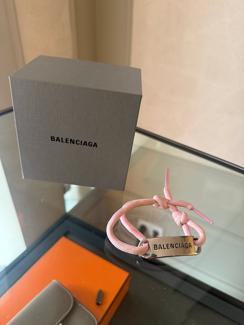 Balenciaga pink cord bracelet Designer-engraved brushed silver-tone plaque, adjustable "Balenciaga" enscription