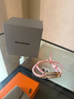 Balenciaga pink cord bracelet Designer-engraved brushed silver-tone plaque, adjustable "Balenciaga" enscription