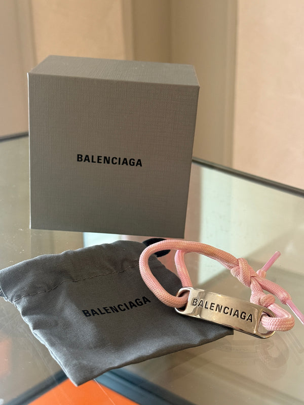 Balenciaga pink cord bracelet Designer-engraved brushed silver-tone plaque, adjustable "Balenciaga" enscription