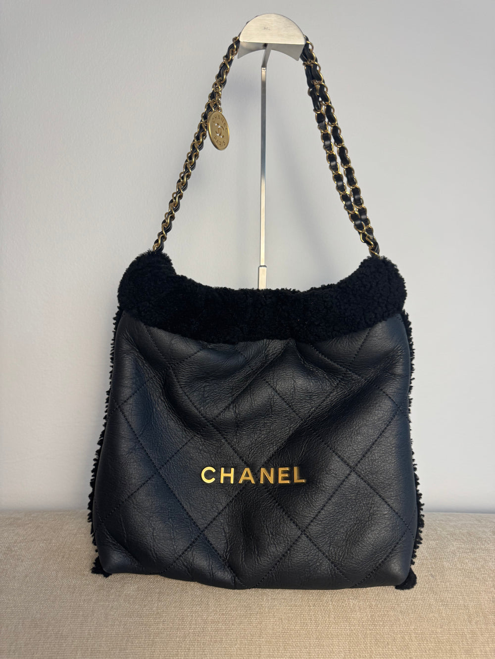 Chanel 2023 Shearling Trim Quilted Small 22 Lambskin Hobo Bag Black Gold Leather CC Coco Mark Chain Strap