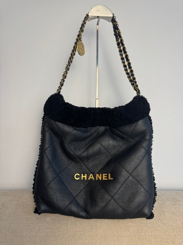 Chanel 2023 Shearling Trim Quilted Small 22 Lambskin Hobo Bag Black Gold Leather CC Coco Mark Chain Strap