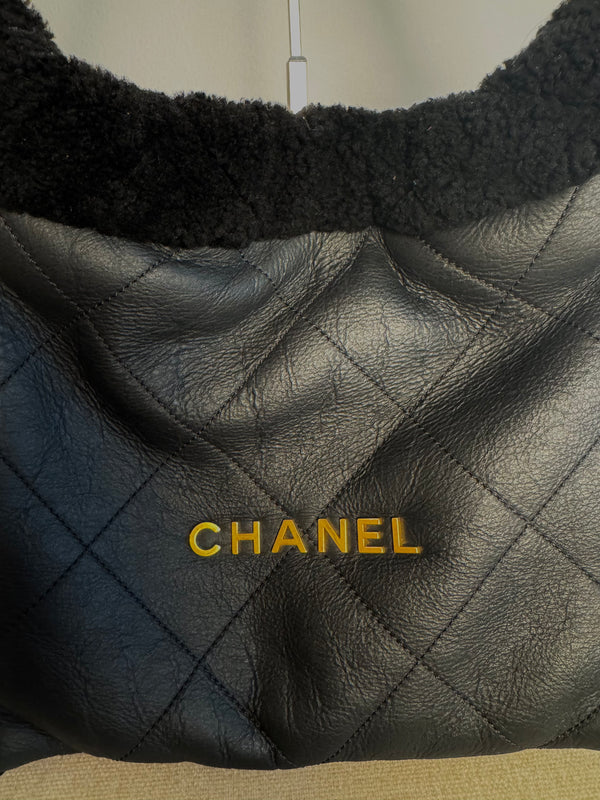 Chanel 2023 Shearling Trim Quilted Small 22 Lambskin Hobo Bag Black Gold Leather CC Coco Mark Chain Strap