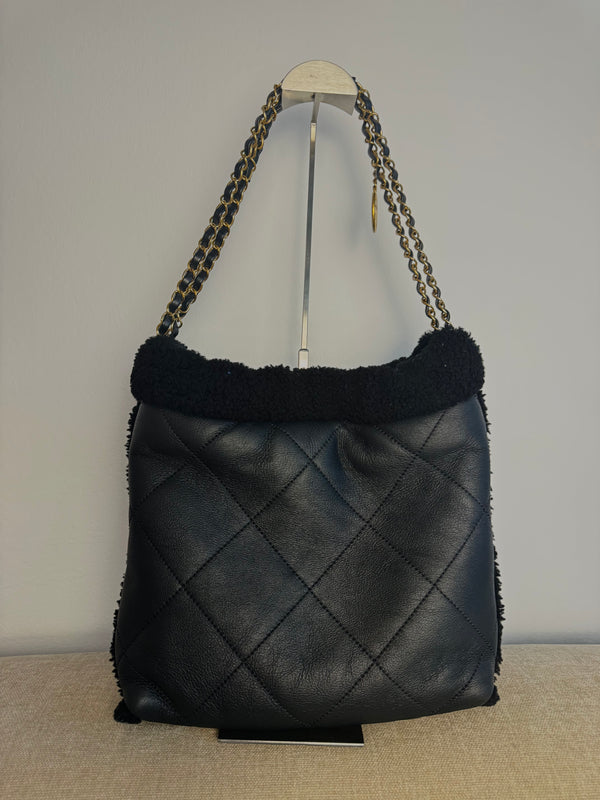 Chanel 2023 Shearling Trim Quilted Small 22 Lambskin Hobo Bag Black Gold Leather CC Coco Mark Chain Strap