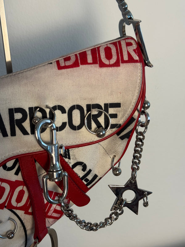 Rare Vintage Christian Dior "Hardcore" piercing graphic limited edition Saddlebag S/S 2003 John Galliano White Black red chain charm detailing