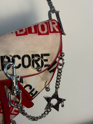 Rare Vintage Christian Dior "Hardcore" piercing graphic limited edition Saddlebag S/S 2003 John Galliano White Black red chain charm detailing