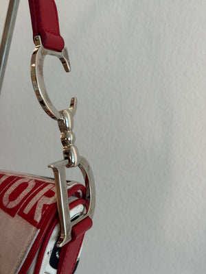 Rare Vintage Christian Dior "Hardcore" piercing graphic limited edition Saddlebag S/S 2003 John Galliano White Black red chain charm detailing
