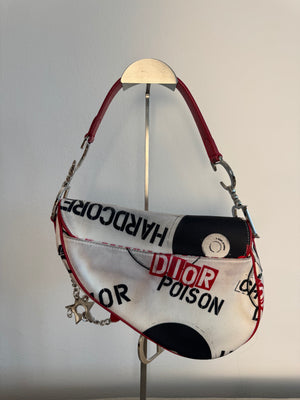 Rare Vintage Christian Dior "Hardcore" piercing graphic limited edition Saddlebag S/S 2003 John Galliano White Black red chain charm detailing