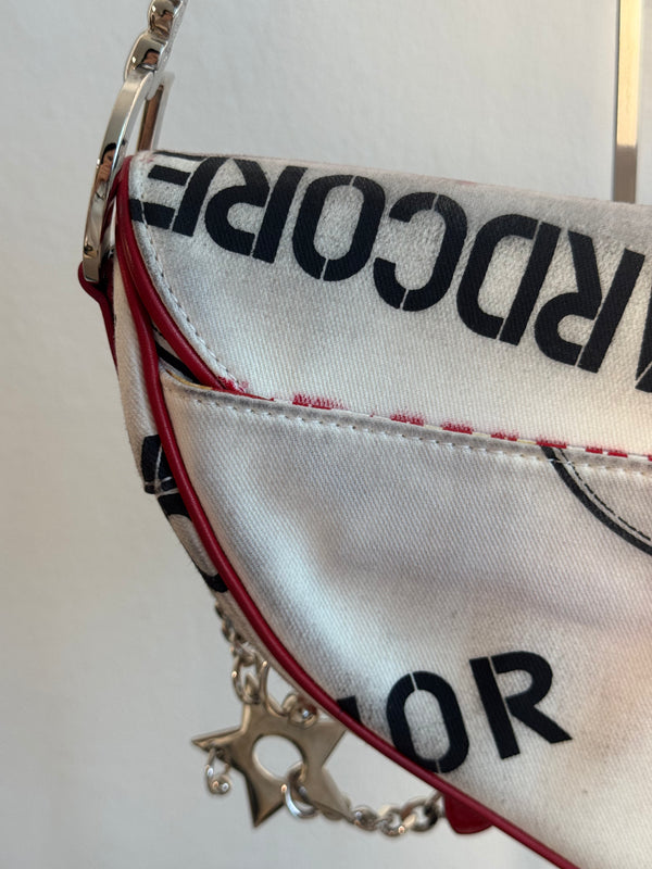 Rare Vintage Christian Dior "Hardcore" piercing graphic limited edition Saddlebag S/S 2003 John Galliano White Black red chain charm detailing