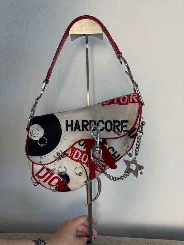 Rare Vintage Christian Dior "Hardcore" piercing graphic limited edition Saddlebag S/S 2003 John Galliano White Black red chain charm detailing