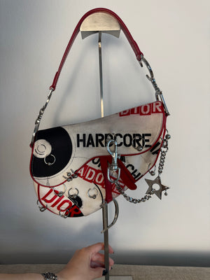Rare Vintage Christian Dior "Hardcore" piercing graphic limited edition Saddlebag S/S 2003 John Galliano White Black red chain charm detailing