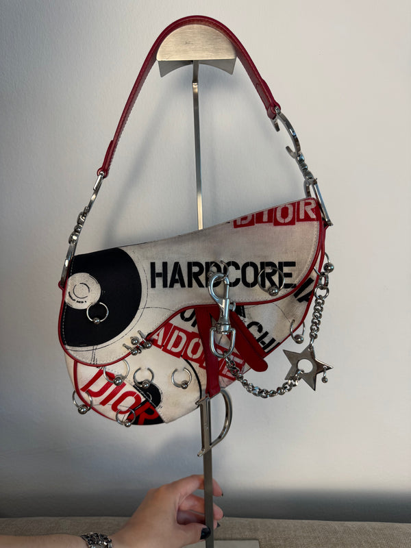 Rare Vintage Christian Dior "Hardcore" piercing graphic limited edition Saddlebag S/S 2003 John Galliano White Black red chain charm detailing