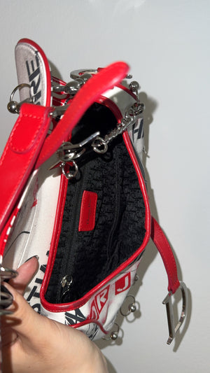 Rare Vintage Christian Dior "Hardcore" piercing graphic limited edition Saddlebag S/S 2003 John Galliano White Black red chain charm detailing